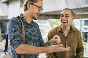 Two men business casual speaking